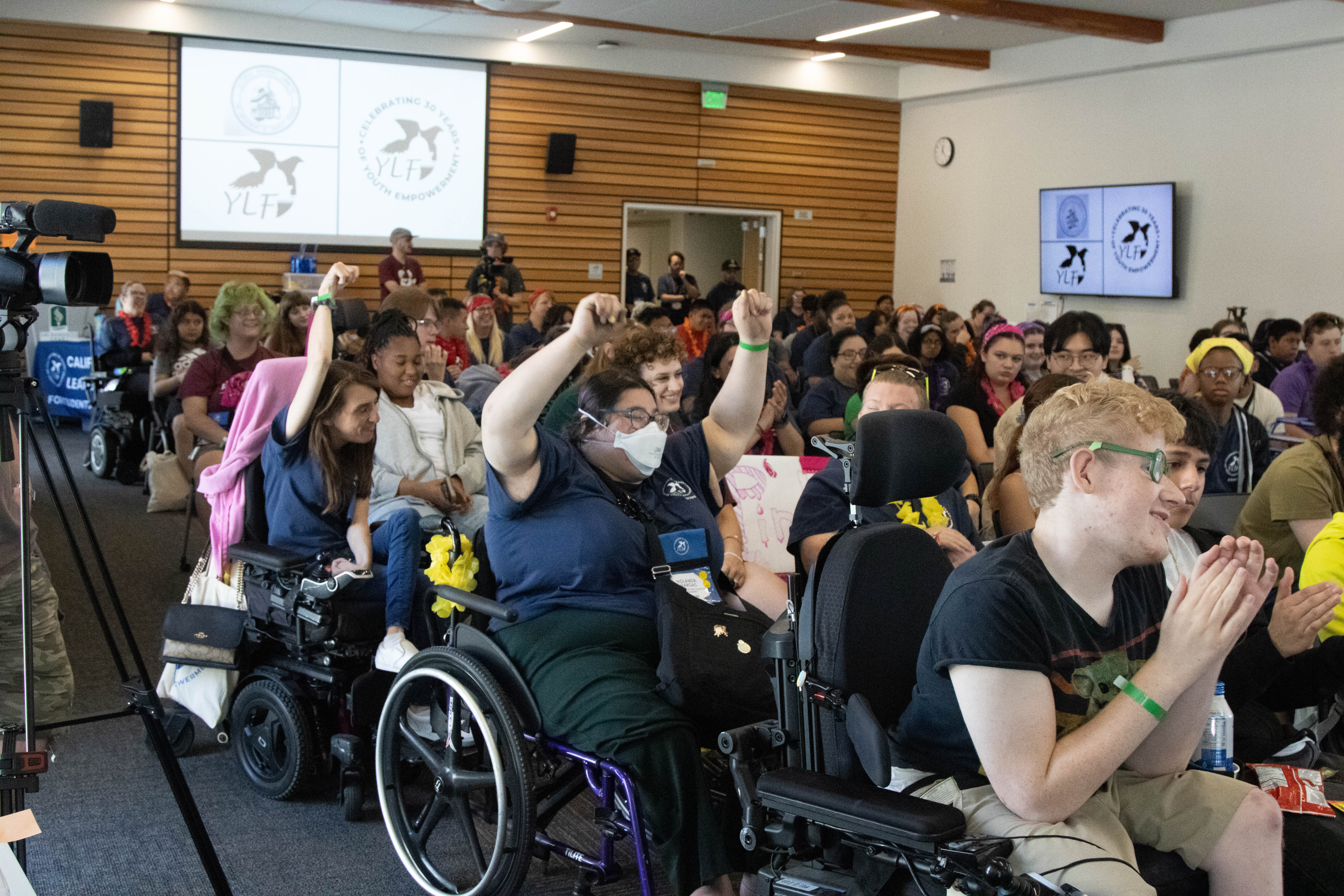 Delegates and Staff cheering